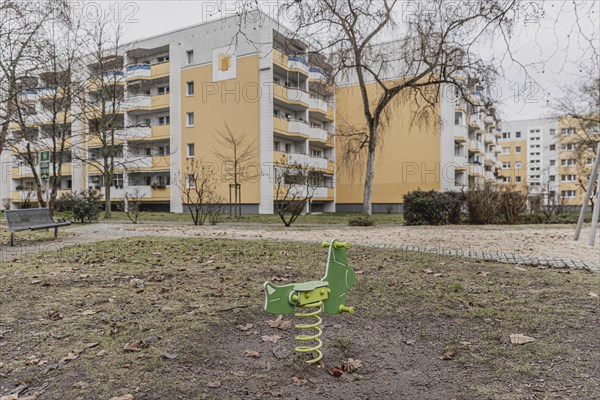 Abandoned playground in front of prefabricated buildings in the Marzahn district, photographed in Berlin, 01.02.2023., Berlin, Germany, Europe