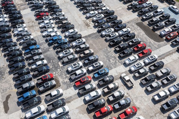 Hamtramck, Michigan, New Ford F-150 pickup trucks and other truck models are parked, unable to be sold, during the global shortage of semiconductor chips