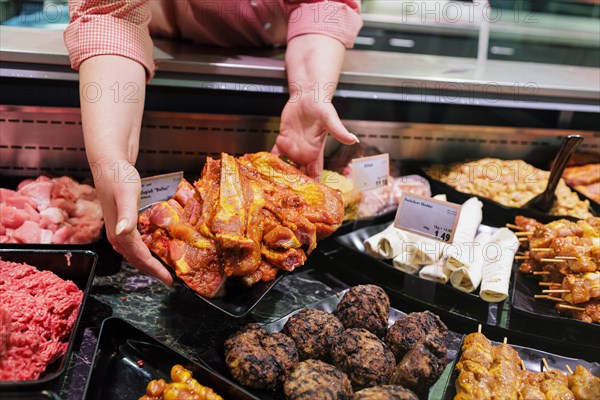 Meat and barbecue in the supermarket., Radevormwald, Germany, Europe