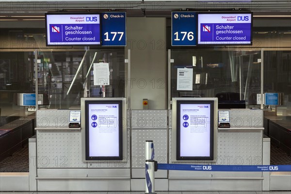 Duesseldorf Airport, DUS, departure hall, terminal, Airport International in lockdown during Corona crisis, hardly any travel and only few departure connections due to travel restrictions, Duesseldorf, North Rhine-Westphalia, Germany, Europe