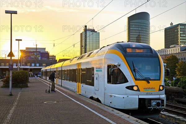 Central station with local train at sunrise, Dortmund, Ruhr area, North Rhine-Westphalia, Germany, Europe