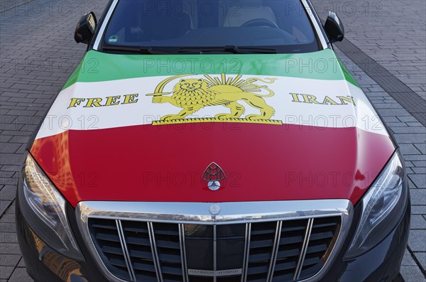 Maybach with painted Iranian flag and slogan Free Iran, demonstration against the Mullah regime on 25.2.23, Duesseldorf, North Rhine-Westphalia, Germany, Europe