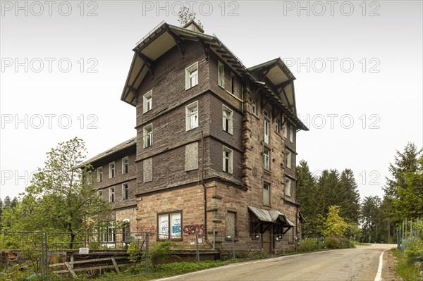 Once fashionable luxury hotels on the Black Forest High Road are crumbling and in ruins. One example is the former Hundseck spa hotel near Ottersweier, Baden-Wuerttemberg, Germany, Europe