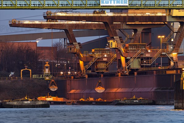 Harbour cranes unloading, Suedhafen Walsum of Thyssenkrupp Steel Europe AG on the Rhine, Duisburg, North Rhine-Westphalia, Germany, Europe