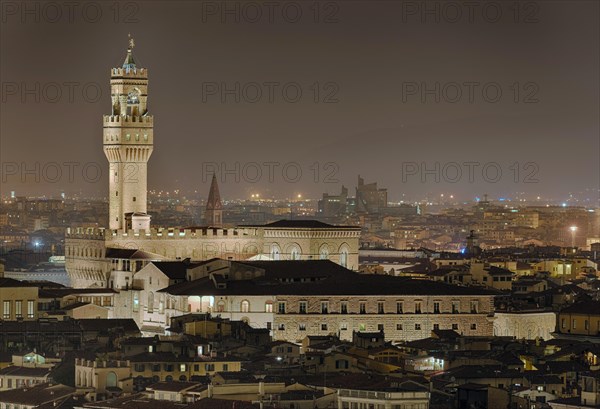 Palazzio Vecchio illuminates Florence Italy