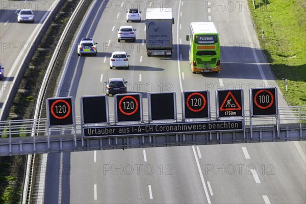 Returners from holiday must heed Corona notices, change notice, traffic sign on the A8 motorway near Stuttgart, Baden-Wuerttemberg, Germany, Europe