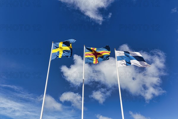 Three flags side by side, Sweden, Aland, Finland, sunny weather, Eckeroe, Fasta Aland, Aland Islands, Aland Islands, Finland, Europe