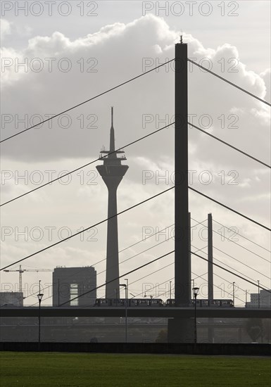 The Rhine Tower and the Rheinknie Bridge, Duesseldorf, North Rhine-Westphalia. Germany