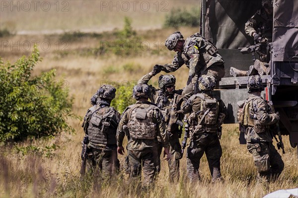 Soldiers of the Jaegerbataillo taken during a rescue of casualties in the context of a simulated combat situation at the Bundeswehr Combat Training Centre in Letzlingen, The soldiers wear AGDUS equipment