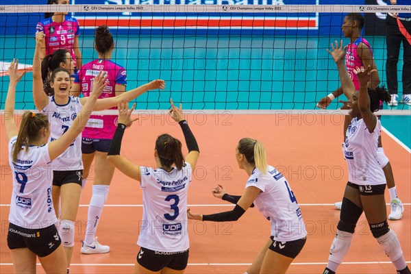 Allianz MTV Stuttgart players cheer after winning a point