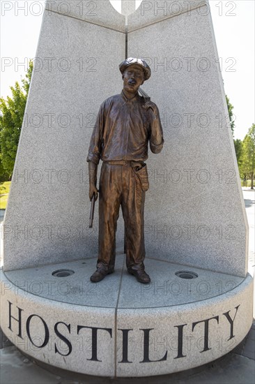 Tulsa, Oklahoma, Hope Plaza at John Hope Franklin Reconciliation Park. The park is a memorial based on the 1921 race massacre in which many African-Americans were murdered and the Greenwood District burned to the ground. The plazas sculpture includes three figures from the race massacre representing Humiliation, Hostility, and Hope