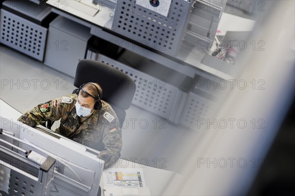 A soldier sits in the evaluation centre at the Bundeswehr Combat Training Centre in Letzling Simulated battles and exercises are documented and analysed here., Letzlingen, Germany, Europe