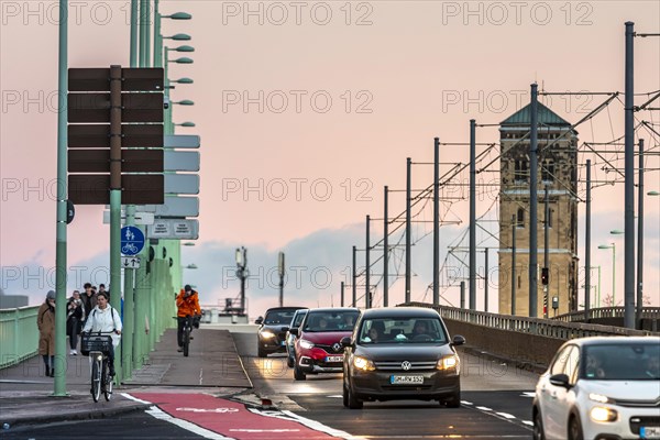 Road traffic on the Deutz Bridge, in the background the church tower of St. Heribert, Cologne, North Rhine-Westphalia, Germany, Europe