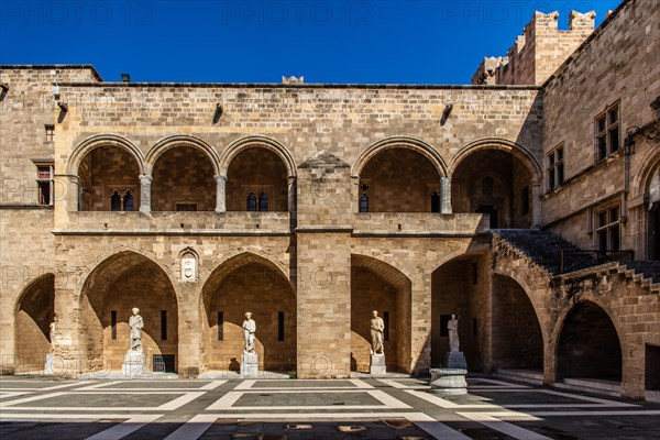 Inner courtyard surrounded by arcades with statues from Hellenistic and Roman times, Grand Masters Palace built in the 14th century by the Johnnite Order, fortress and palace for the Grand Master, UNESCO World Heritage Site, Old Town, Rhodes Town, Greece, Europe