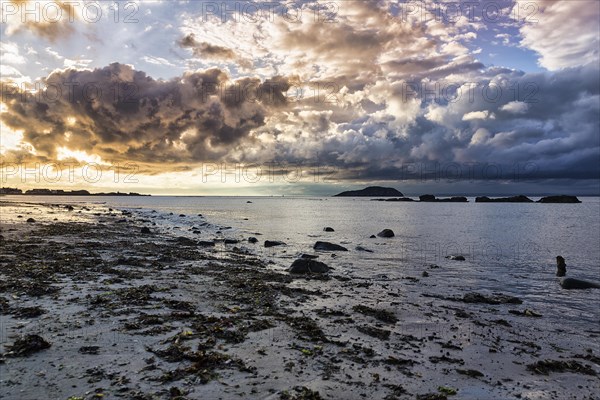 Dramatic cloudy sky over coastline