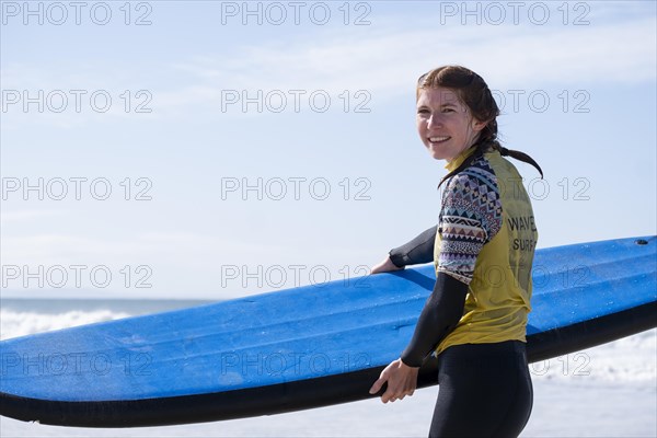 Surfers on the beach at Jeffreys Bay near Port Elizabeth