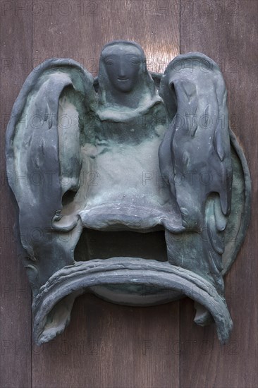 Left bronze fitting on the door of the Tugendbrunnenpotrtal