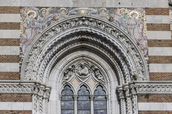 Detail with mosaics of the facade of the Capuchin Church of Our Lady of Lourdes