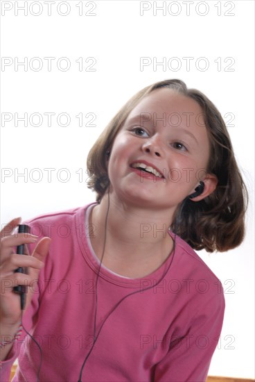 Girl listening to mp3 player