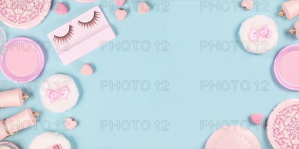 Banner with cute pink makeup beauty products like brushes