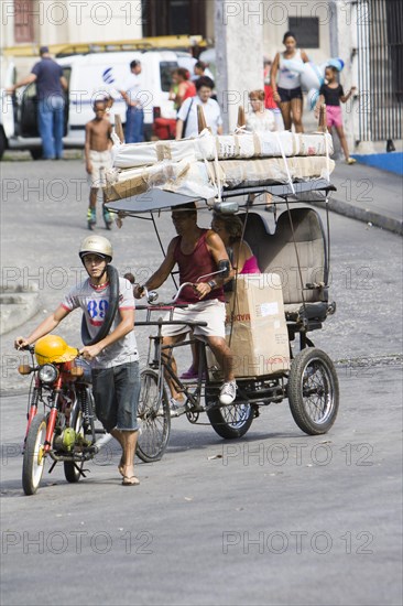 Old colorful horse and donkey carts in the streets of Havana