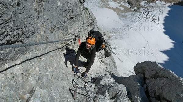 Passage via ferrata with a large exposure and an amazing view of the mountain range and the glacier. Zugspitze massif