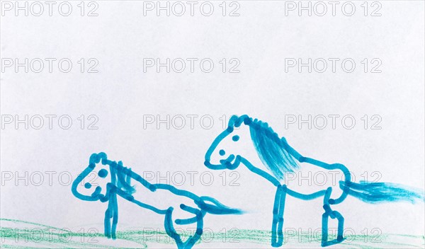 Childrens drawing of 2 horses