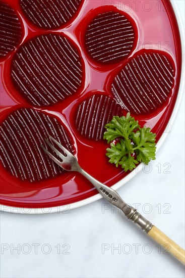 Sliced pickled beetroot on plate