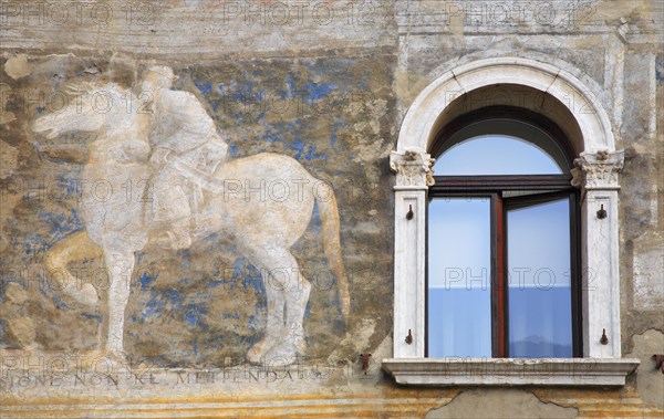 House facades with frescoes on the market square of Trento