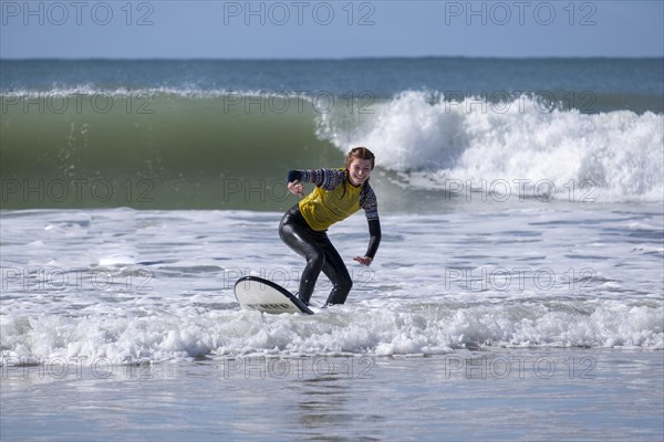 Surfers on the beach at Jeffreys Bay near Port Elizabeth