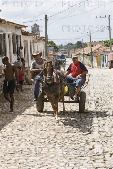 Old colorful horse and donkey carts in the streets of Havana