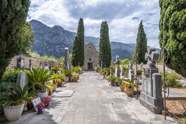 Graves at the cemetery with small chapel