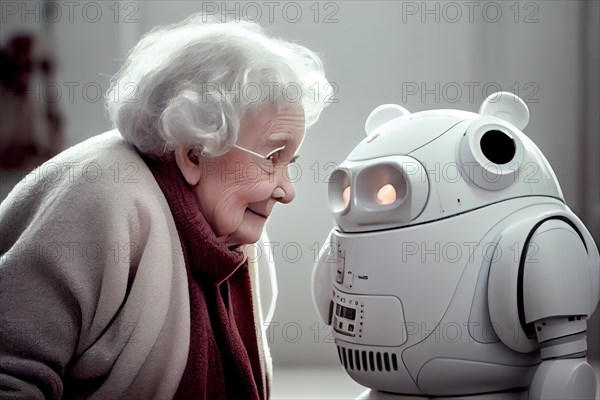 Cute nursing robot talks to a white-haired old lady in a retirement home