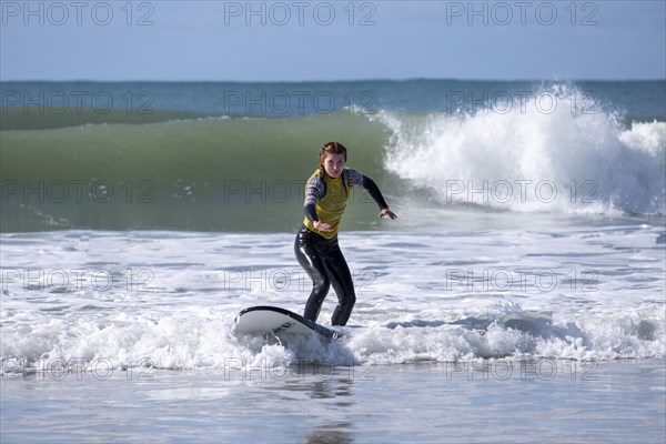 Surfers on the beach at Jeffreys Bay near Port Elizabeth