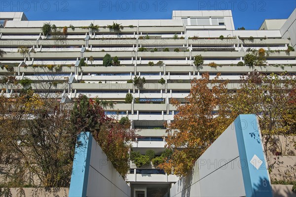 High-rise building with green balconies in the former Olympic Village