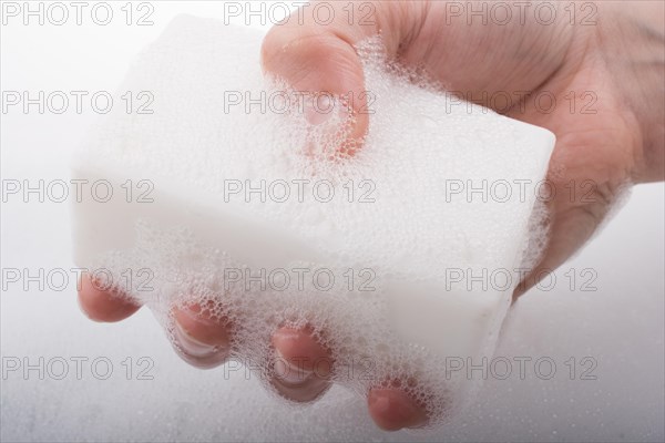 Hand washing and soap foam on a foamy background