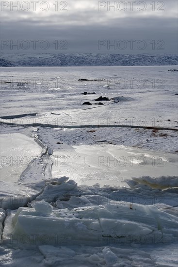The icy fjord of Kangerlussuaq at the harbour of the settlement of Kangerlussuaq