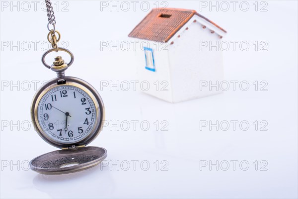 Retro style pocket watch on white background