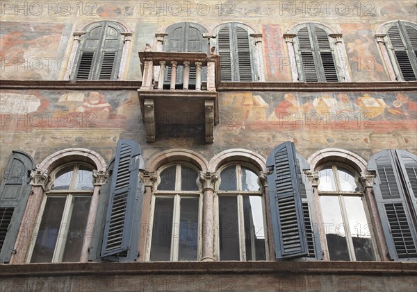 House facades with frescoes on the market square of Trento