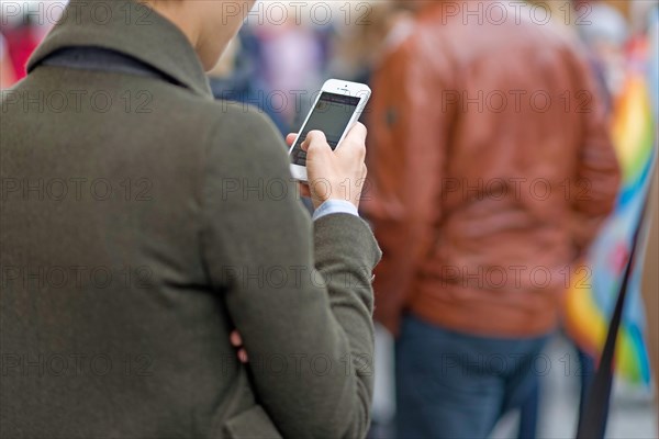 Woman communicating with her mobile phone