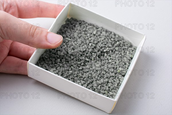 Little green color sand in box as a background texture
