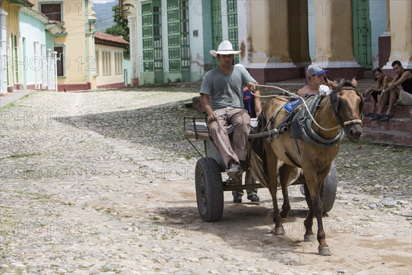 Old colorful horse and donkey carts in the streets of Havana