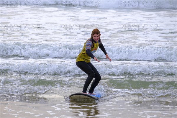 Surfers on the beach at Jeffreys Bay near Port Elizabeth