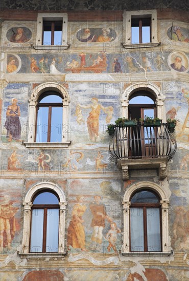 House facades with frescoes on the market square of Trento