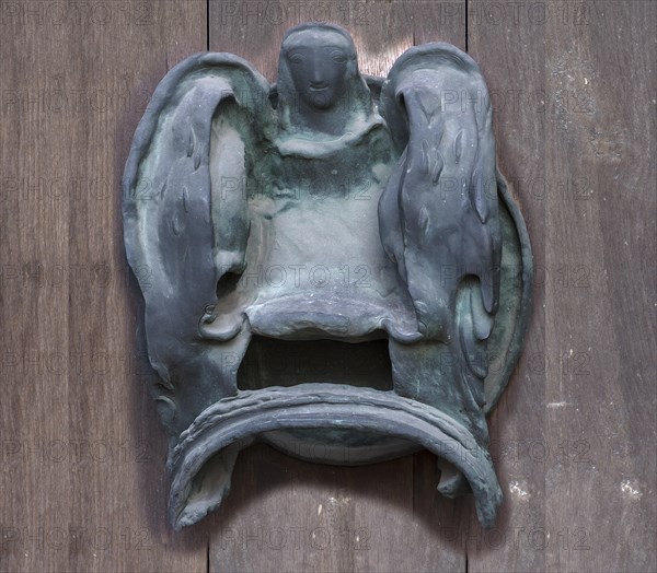 Left bronze fitting on the door of the Tugendbrunnenpotrtal
