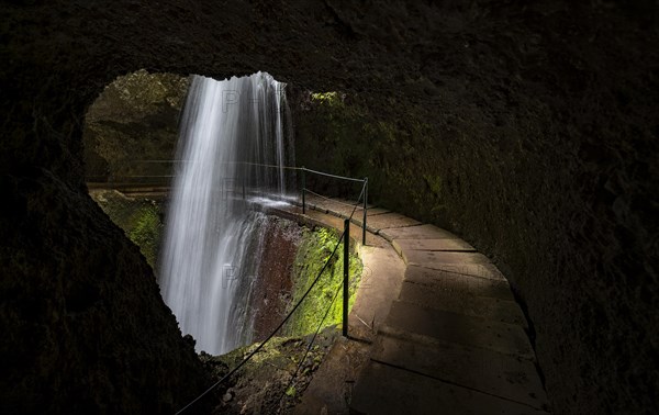 Hiking trail behind waterfall at Levada Nova