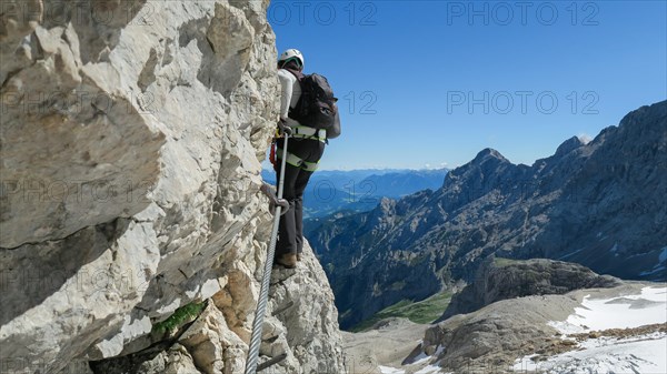 Passage via ferrata with a large exposure and an amazing view of the mountain range and the glacier. Zugspitze massif