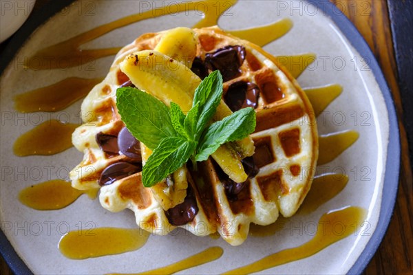 Waffle with maple syrup