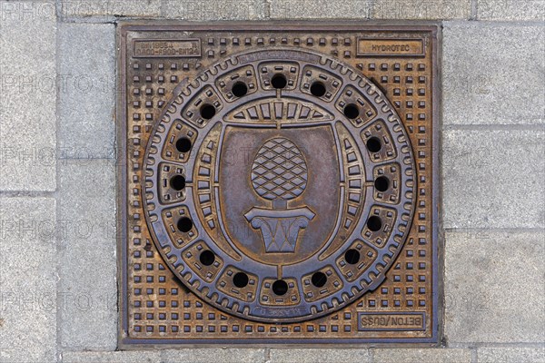Manhole cover with the Augsburg city coat of arms