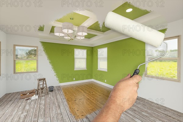 Before and after of man using A paint roller to reveal newly remodeled room with fresh green paint